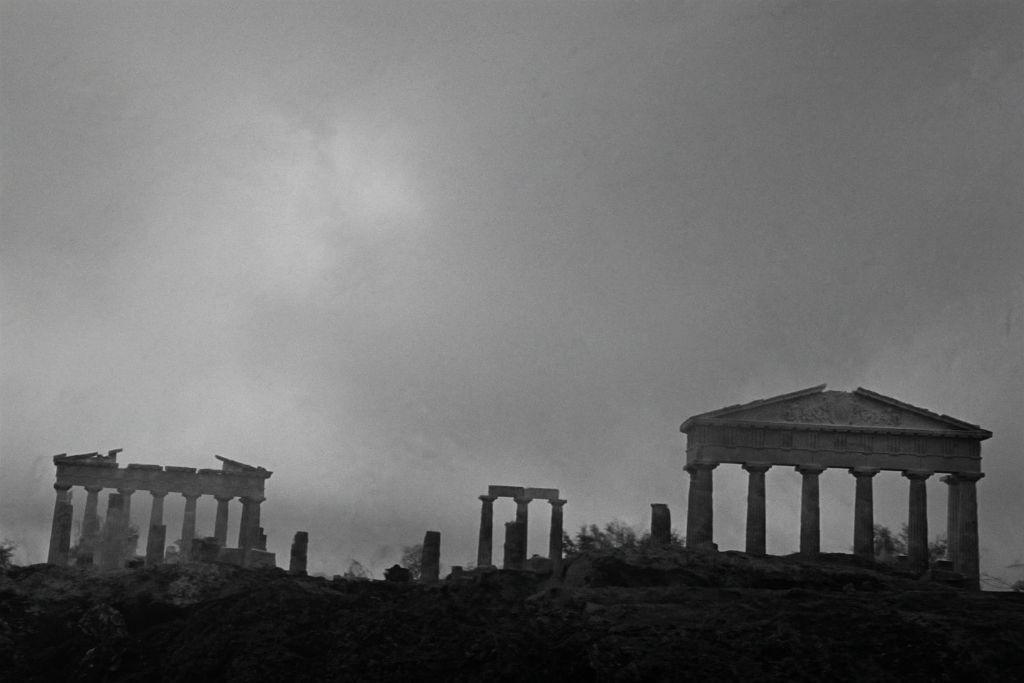 Temple ruins fading into dusk